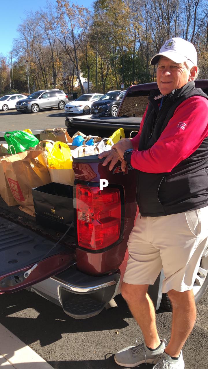 Man dropping off food donation
