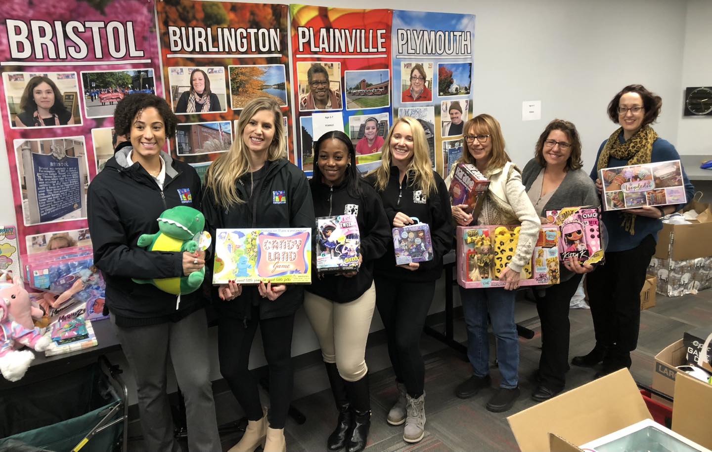 Group of women donating toys